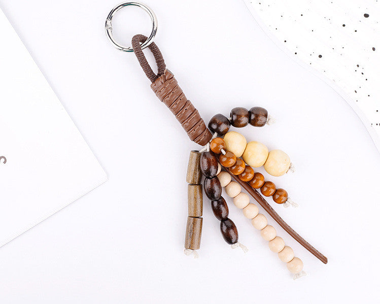 Handmade tassel charm for a leather handbag