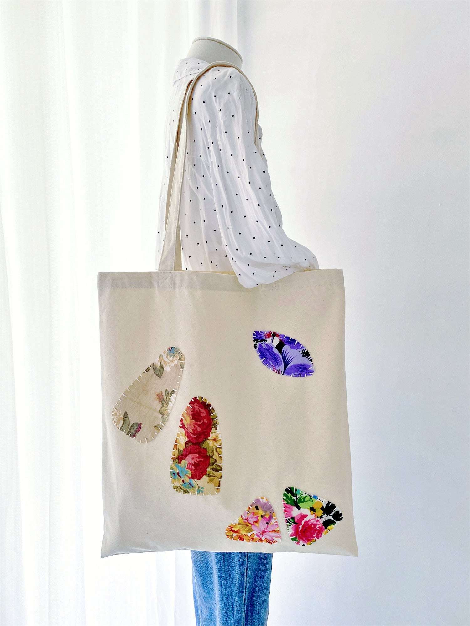 Large tote with artistic patchwork, perfect for slow living routines