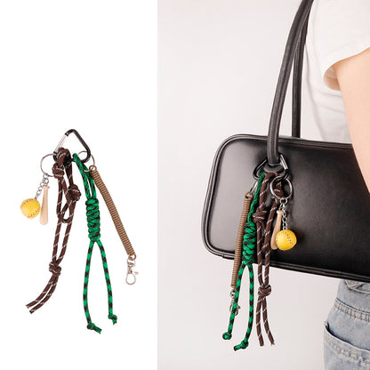 Carabiner bag pendant styled on a relaxed everyday bag