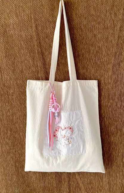 embroidered cotton bag designed for quiet moments and personal gifting