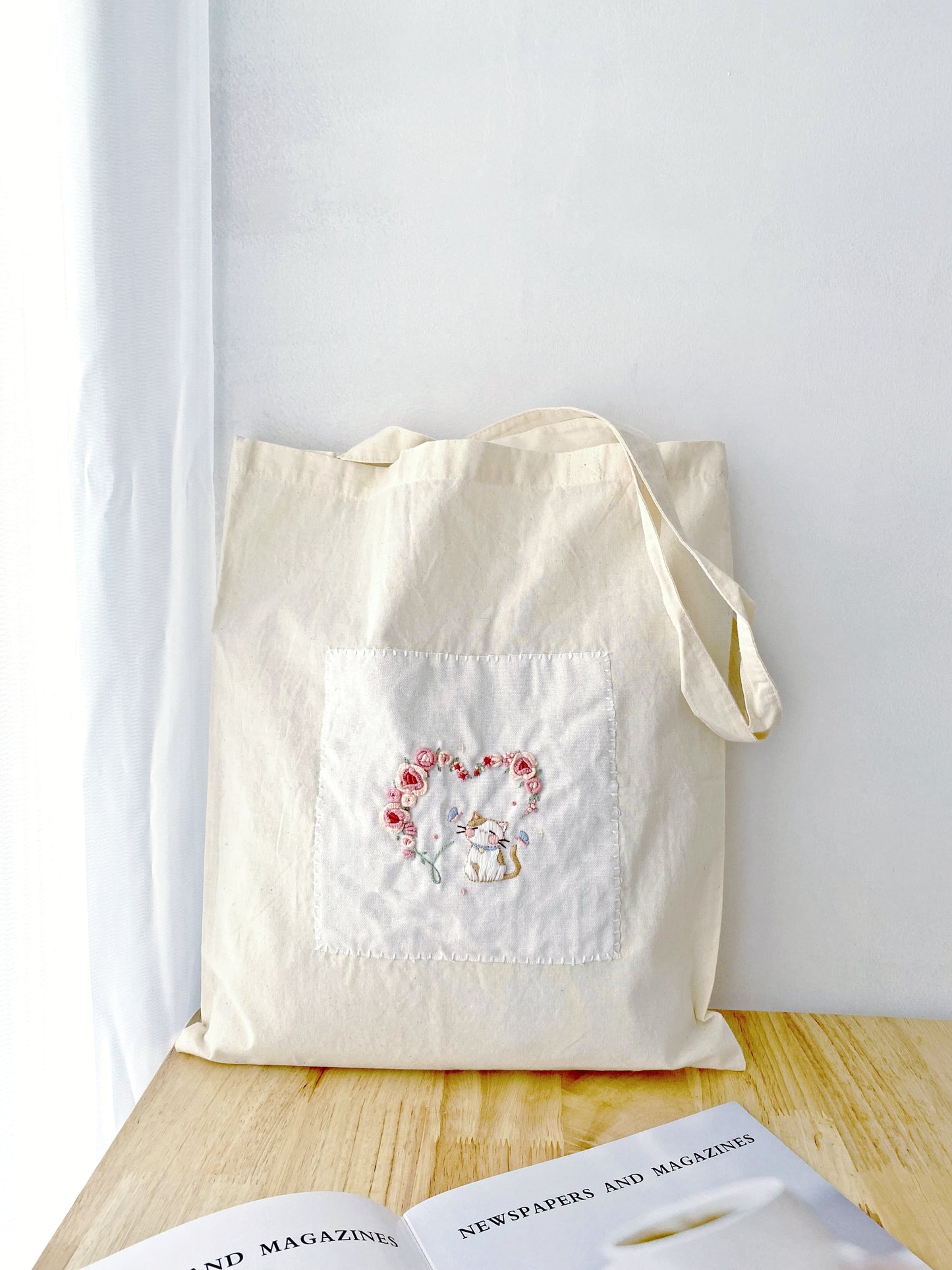 Sustainable, unbleached cotton tote bag appealing to minimalists and conscious shoppers.