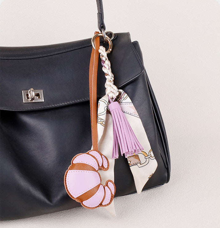 Refined purse decoration with a croissant-inspired design
