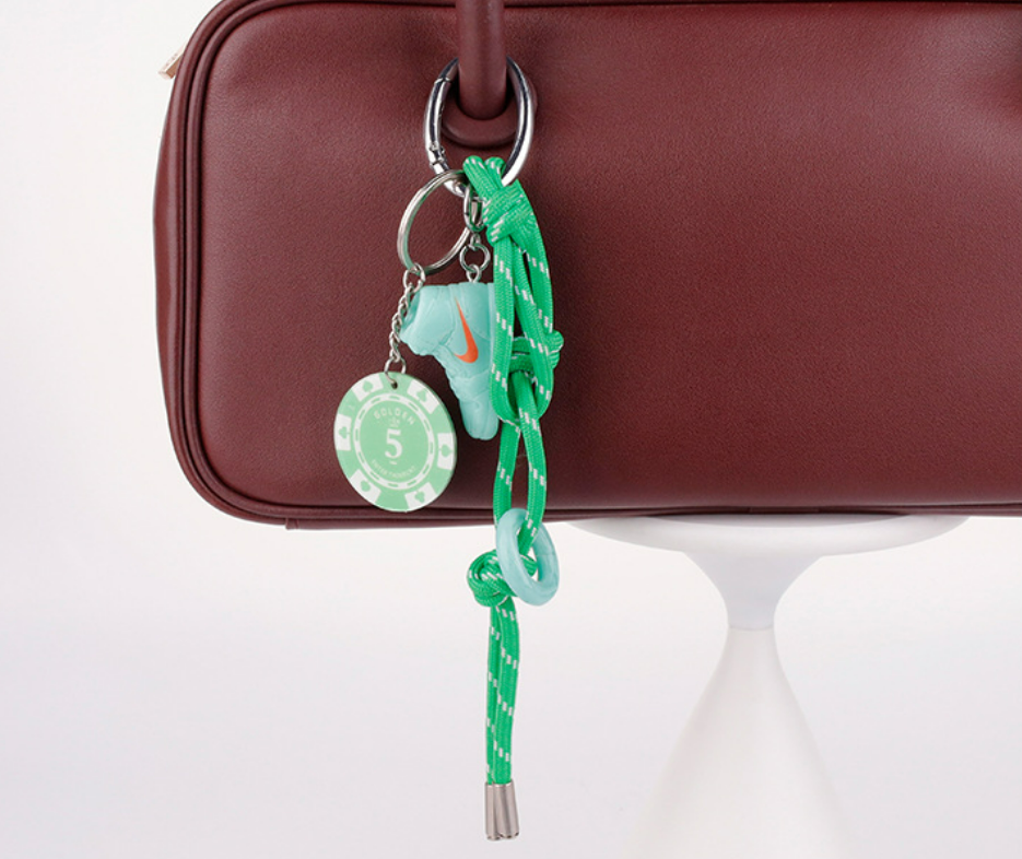 Sporty green bag accessory in an everyday tote