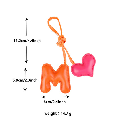 Cute leather heart decoration attached to a purse