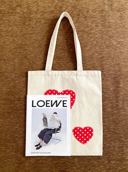 Canvas shoulder bag with original heart patchwork design