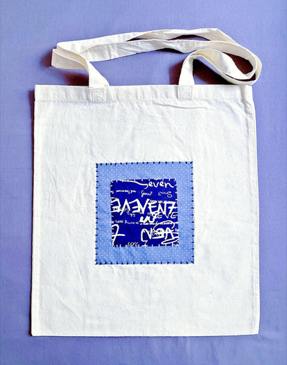 Soft cotton tote with hand-stitched patchwork, chosen by people who prefer reusable bags that feel calm, personal, and easy to live with
