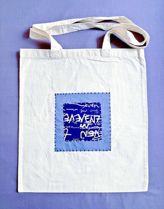Soft cotton tote with hand-stitched patchwork, chosen by people who prefer reusable bags that feel calm, personal, and easy to live with