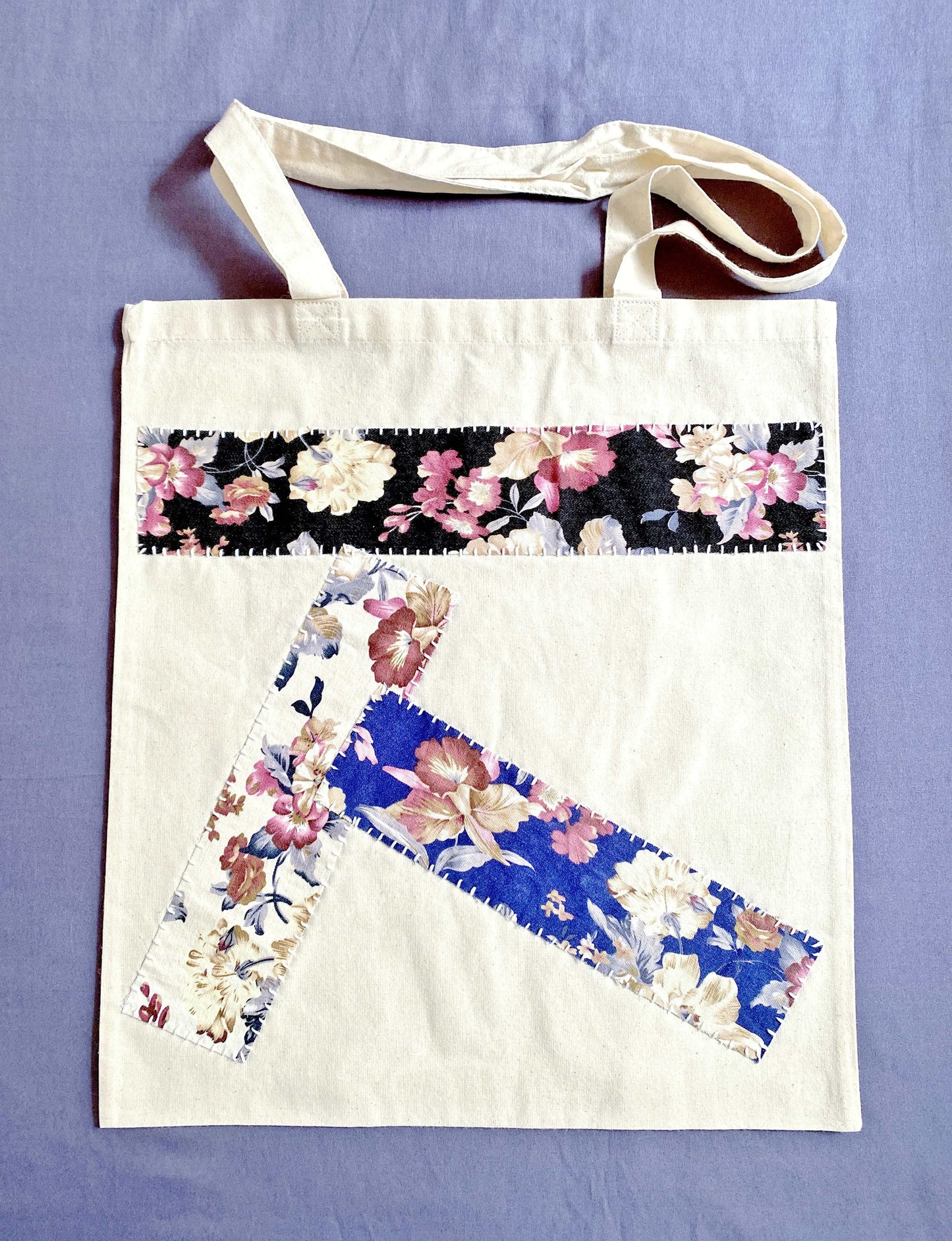 Close-up of the supersoft, natural cotton texture with intricate patchwork stitching.