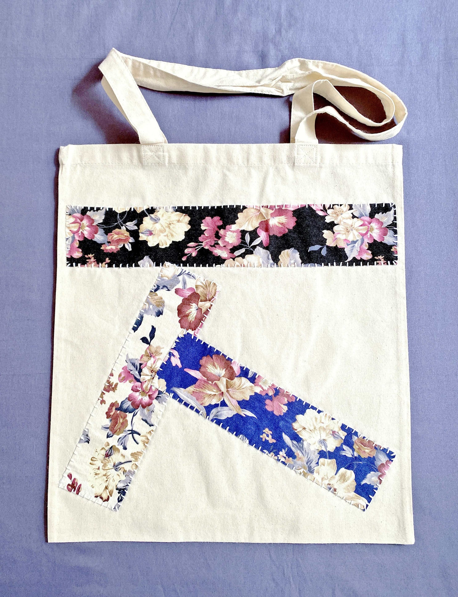 Close-up of the supersoft, natural cotton texture with intricate patchwork stitching.