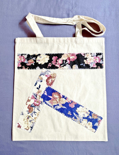 Close-up of the supersoft, natural cotton texture with intricate patchwork stitching.