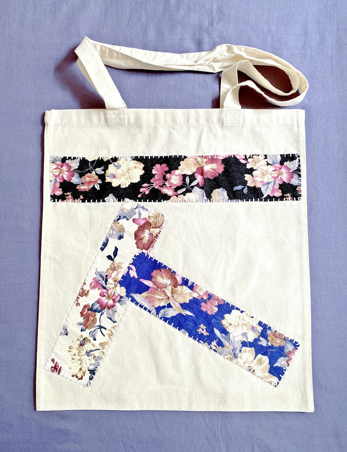 Close-up of the supersoft, natural cotton texture with intricate patchwork stitching.