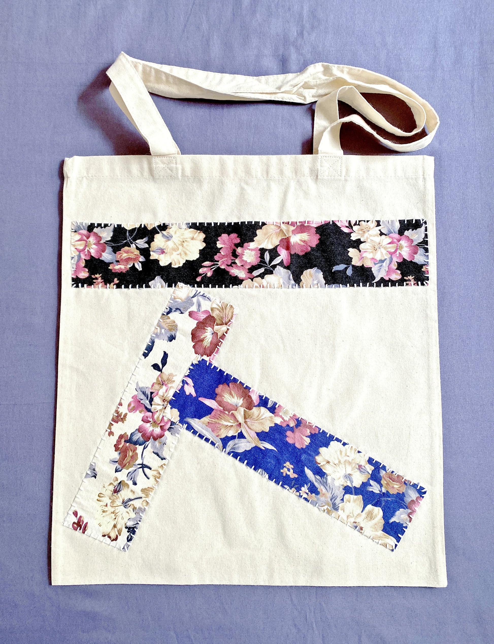 Close-up of the supersoft, natural cotton texture with intricate patchwork stitching.