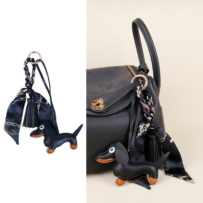 Handmade leather dog charm styled for everyday street purse fashion