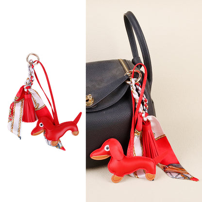 Cute dachshund bag pendant with silk tassel for luxury shoulder bags