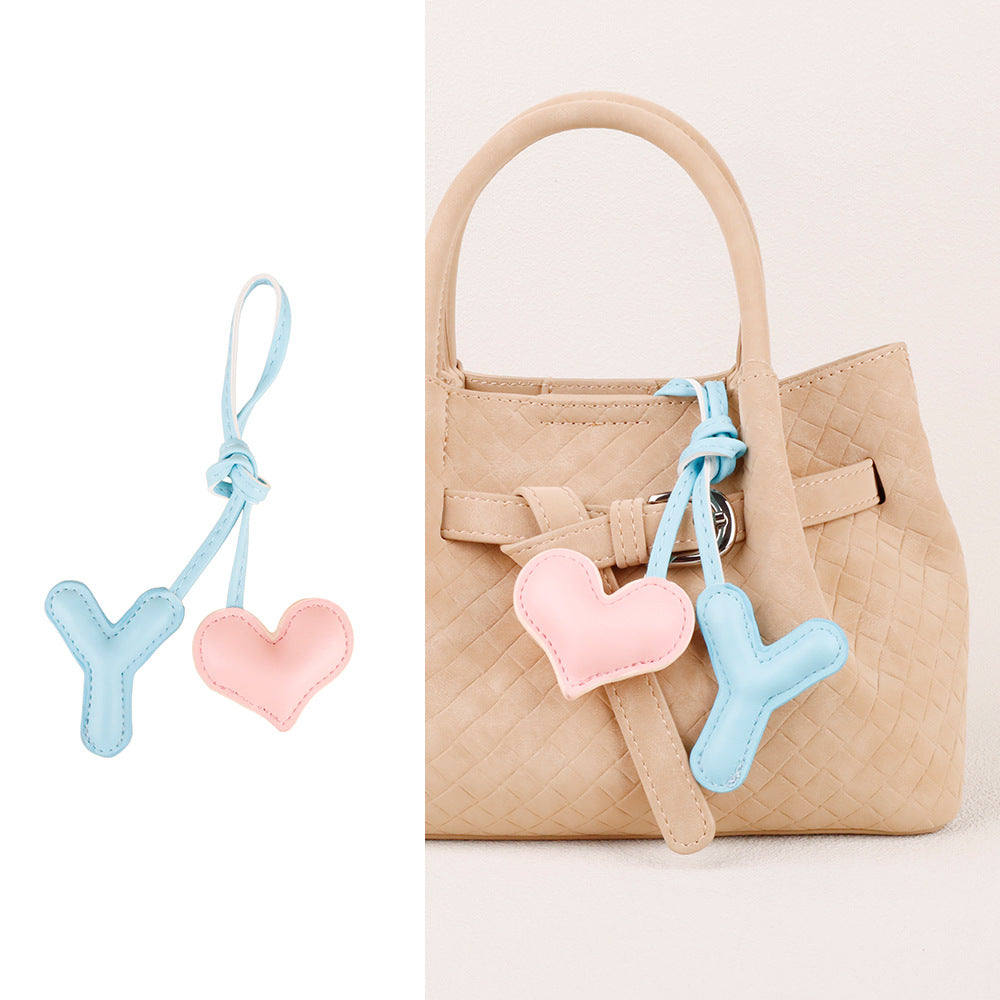 Heart-shaped accessory with a charming alphabet detail
