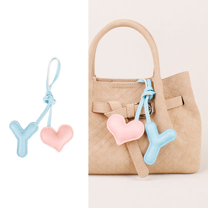 Heart-shaped accessory with a charming alphabet detail