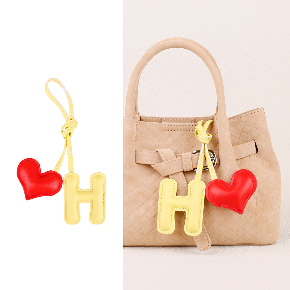Handmade leather heart hanging accessory in close view