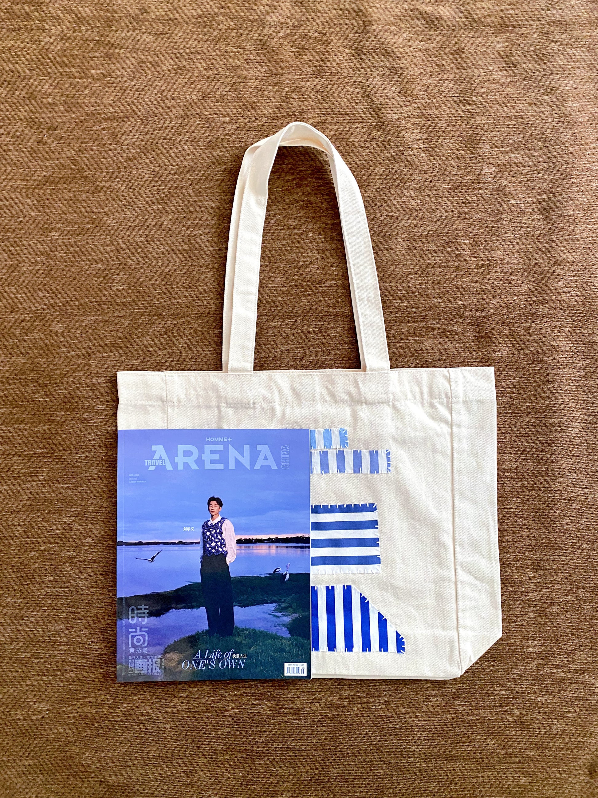 Large cotton canvas tote with one-of-a-kind patchwork artwork selected as a practical yet personal gift