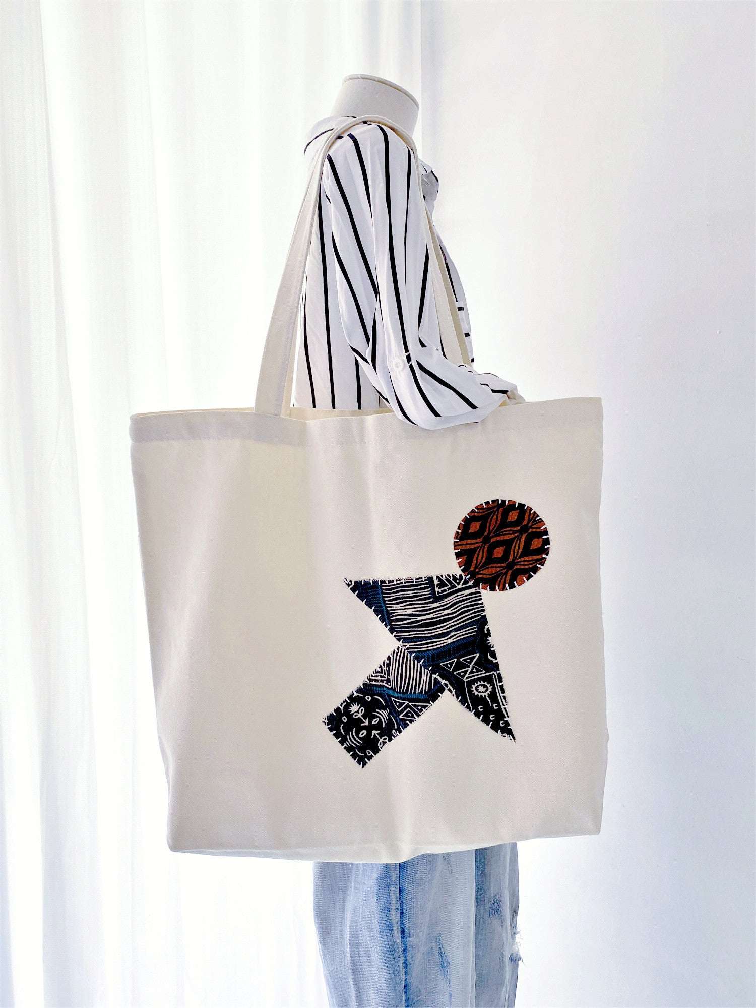 Gift-ready patchwork tote with unique hand-stitched details that make the recipient feel special, unlike standardized factory-made accessories.