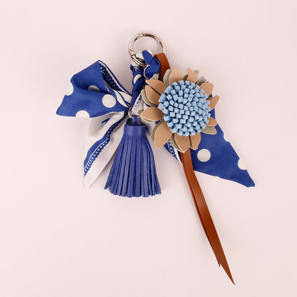 Handmade bow charm for adding detail to a bag