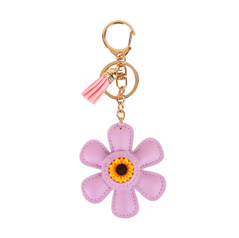 Handcrafted flower charm with tassel for bag styling