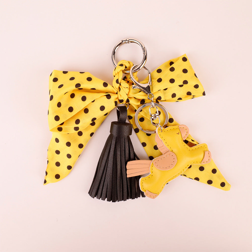 Yellow scarf bow keychain with decorative tassel