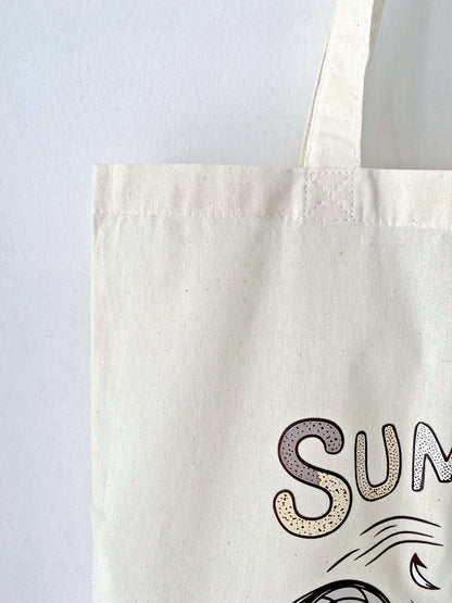 This lightweight, eco-friendly tote bag with a playful kitty print is perfect for running errands or carrying books in style.