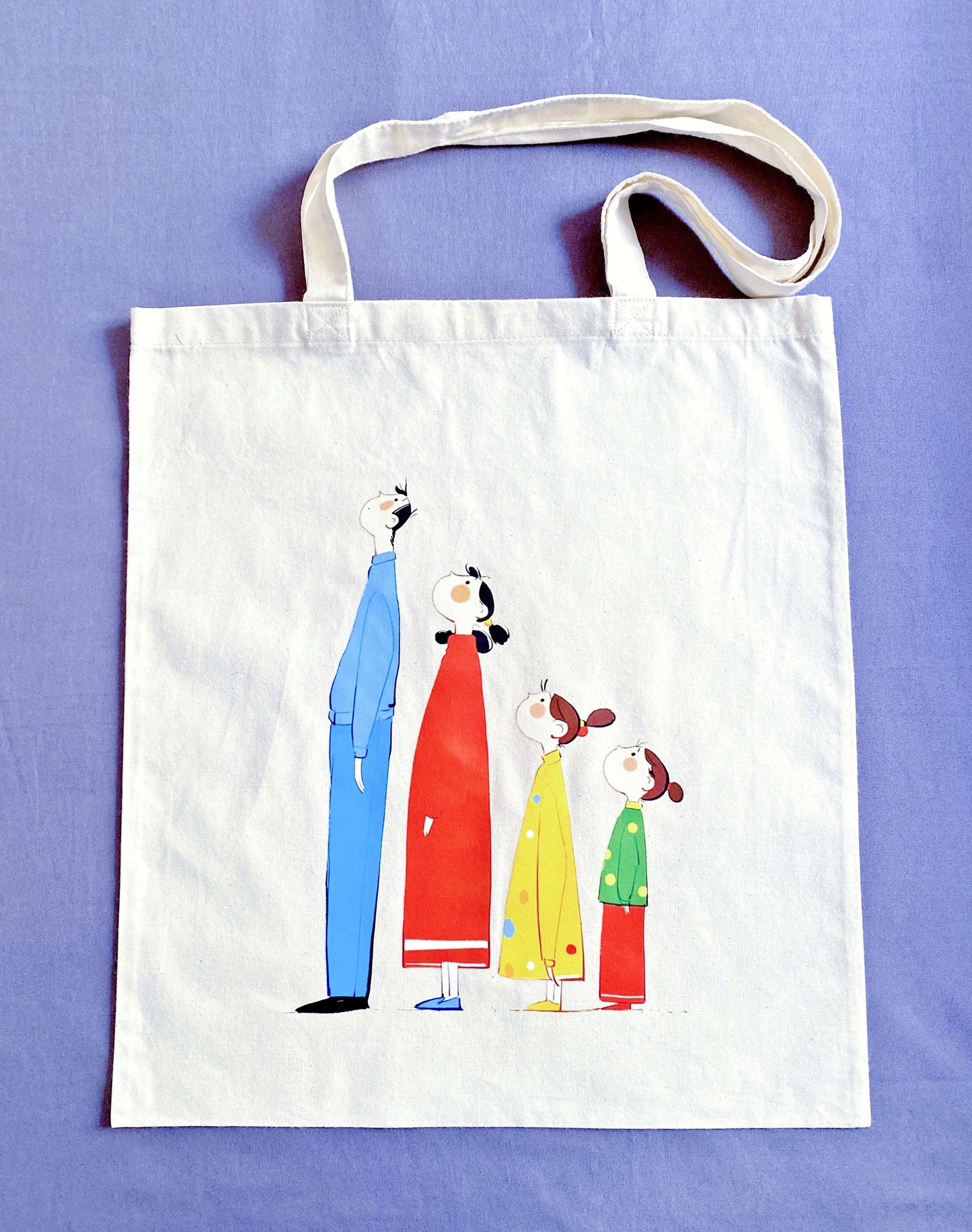 Eco-friendly cotton tote featuring a hand-printed family illustration—perfect for daily use or as a thoughtful gift for loved ones.