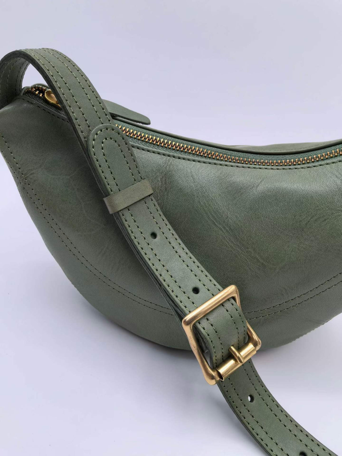 Small leather crossbody purse for sightseeing and city strolls