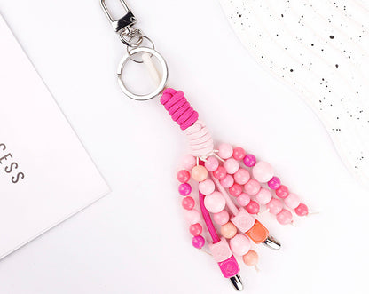 Small pink jade accessory for a phone or bag