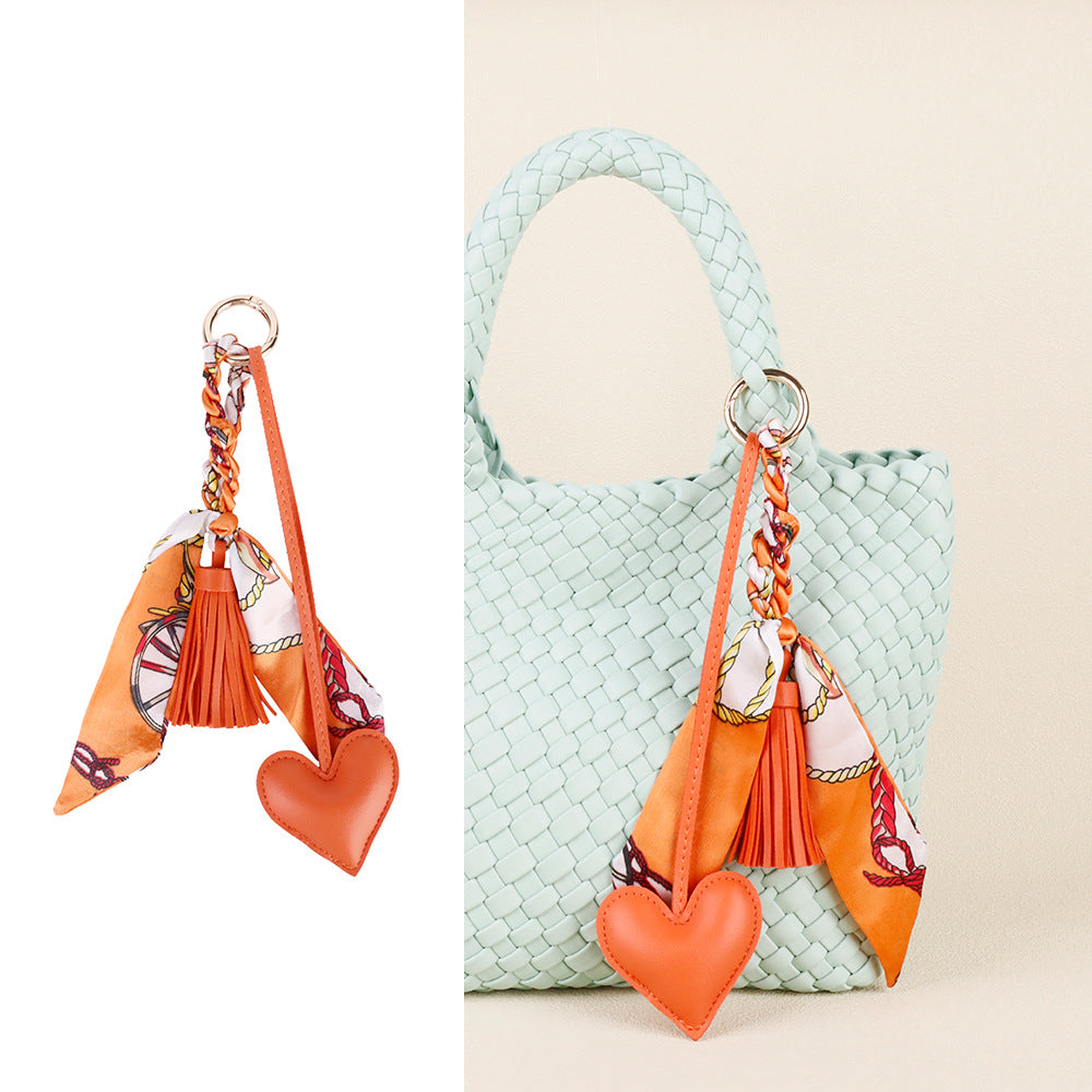Leather look heart charm with braided scarf