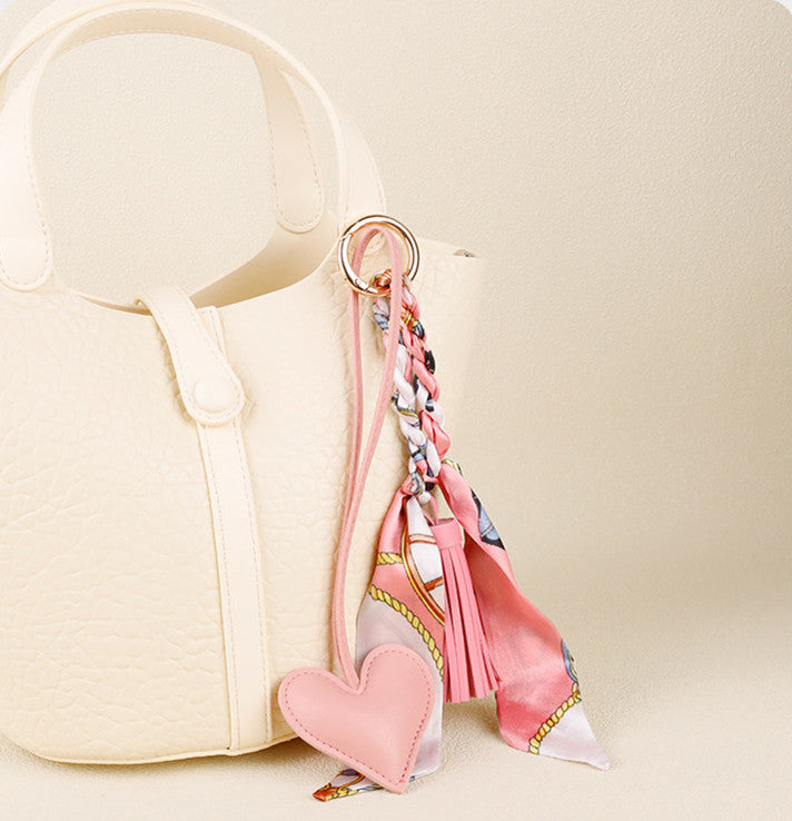 PU leather heart accessory with tassel detail