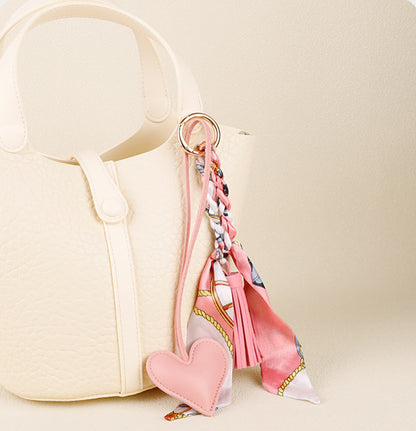 PU leather heart accessory with tassel detail