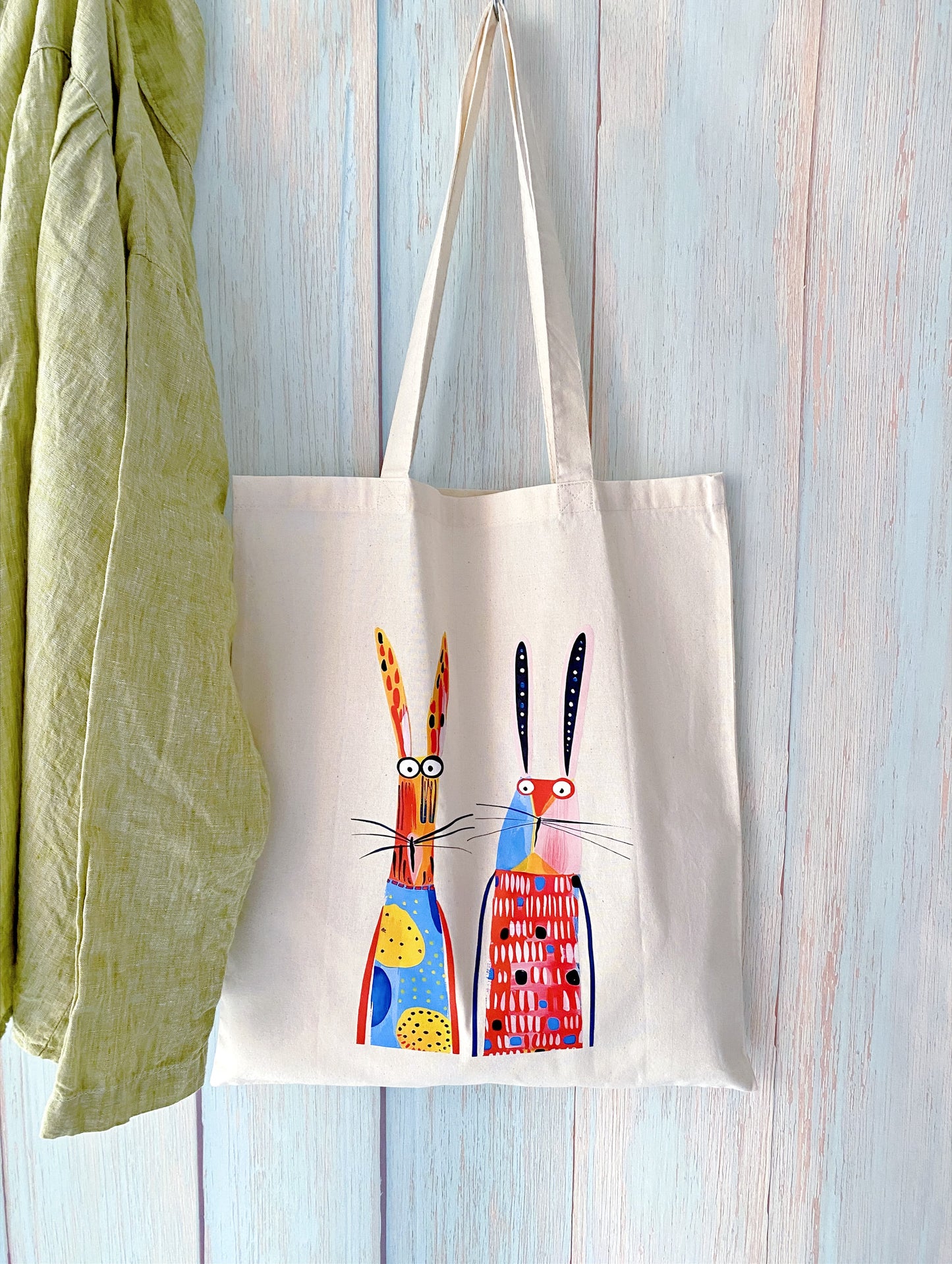 Sustainable cotton carry bag with artisan rabbit design suitable for holiday gifting