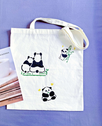 Distinctive alternative to mass-produced fast fashion, hand-detailed panda canvas shopper.