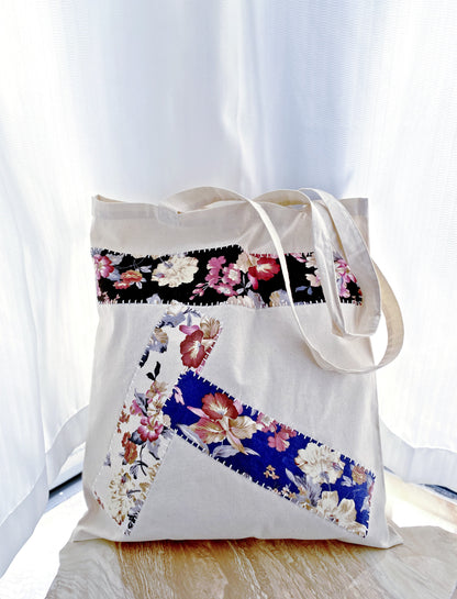 Detailing the distinct, imperfect beauty of hand-sewn fabric collages that make every eco-friendly outing feel personal.