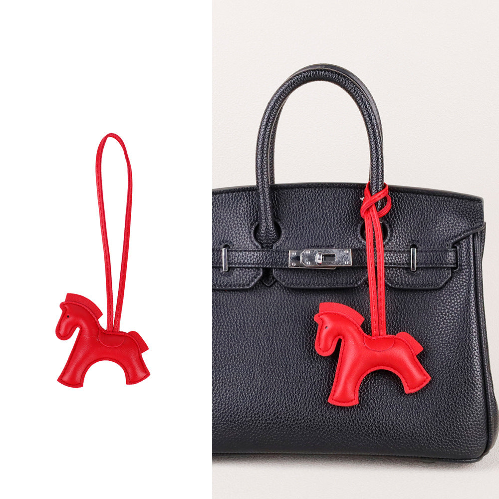 Playful car hanging accessory with scarf and tassel