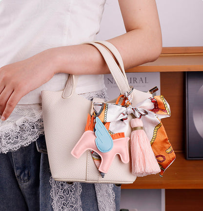 Handmade horse charm for decorating a school backpack