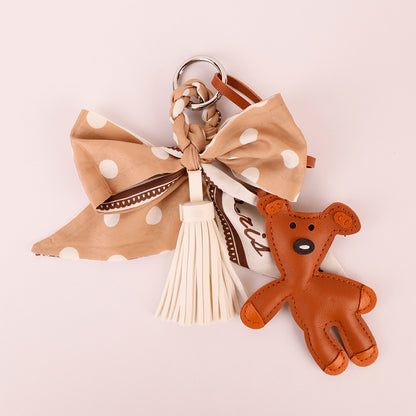 Khaki scarf ribbon decoration for a shoulder bag