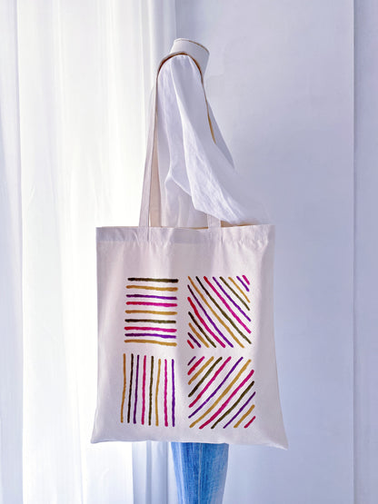 Canvas bag showing a natural fold and soft drape when partially filled.