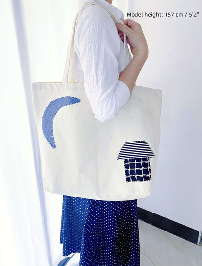 Hand-stitched patchwork tote, a heartwarming gift for friends who value unique, sustainable craftsmanship.