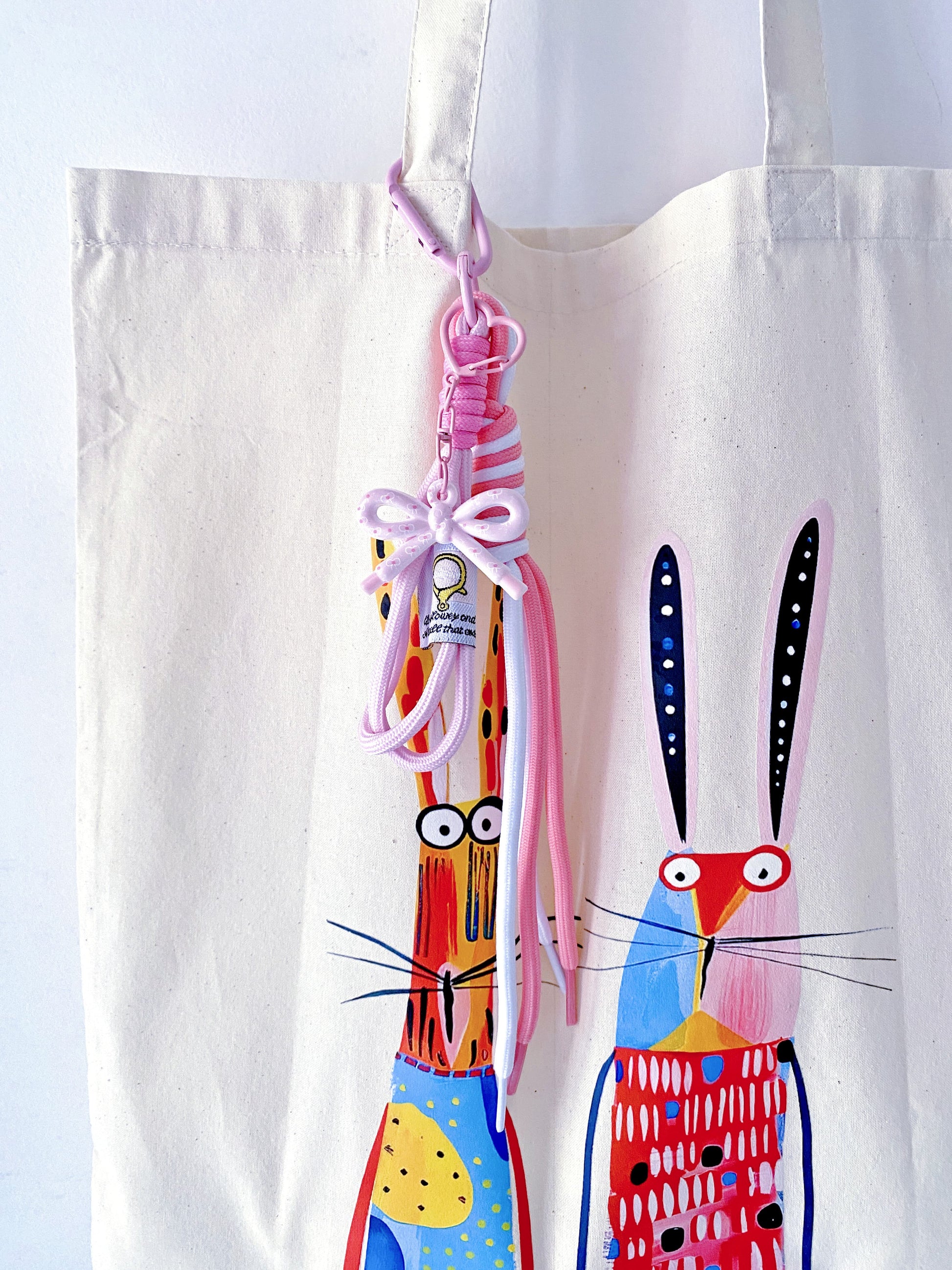 Durable eco-conscious tote filled with fresh market flowers and sourdough.