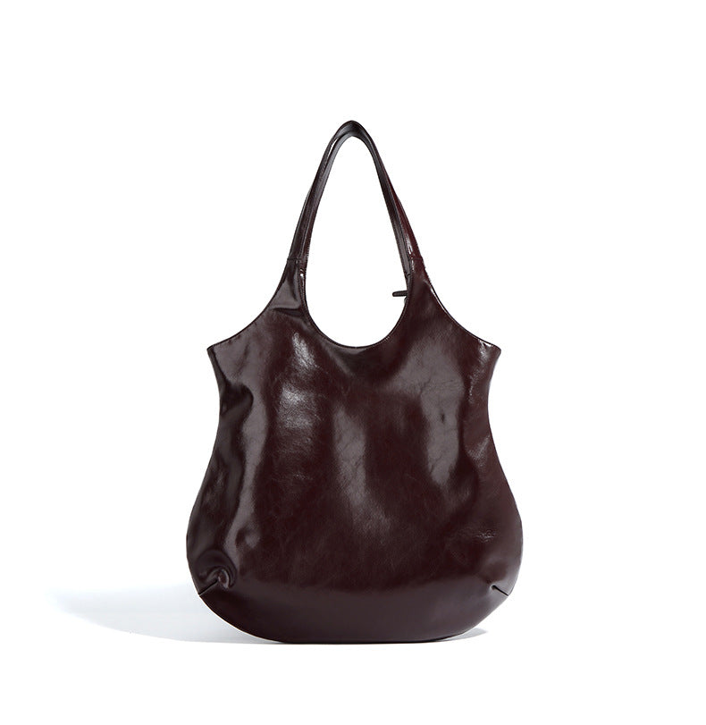 Women's Designer Leather Bucket Tote with Versatile Carrying Options