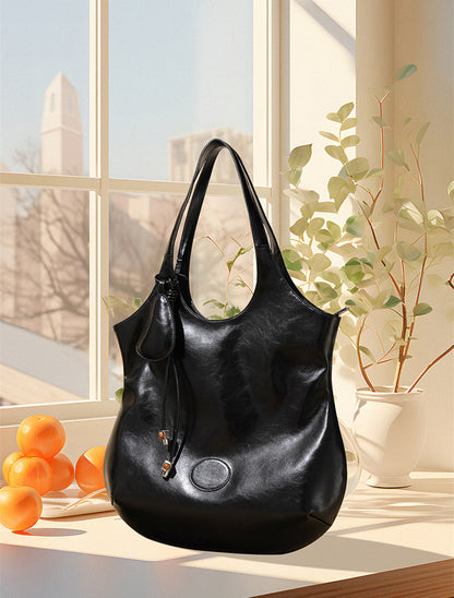 Premium Women's Leather Tote with Bucket Shape and Convertible Design