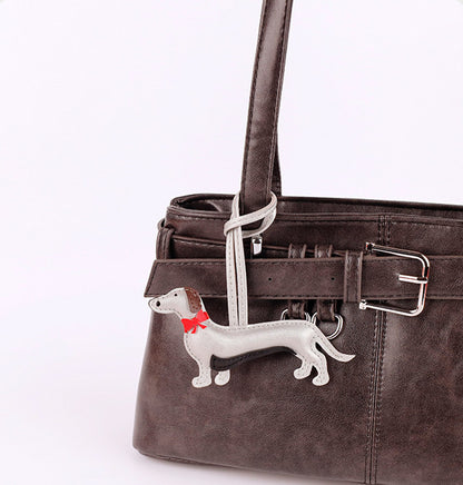 Cute dachshund dog bag charm with playful detail