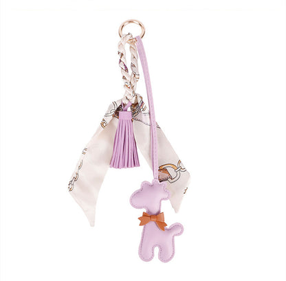 Giraffe themed accessory styled on a casual shoulder bag