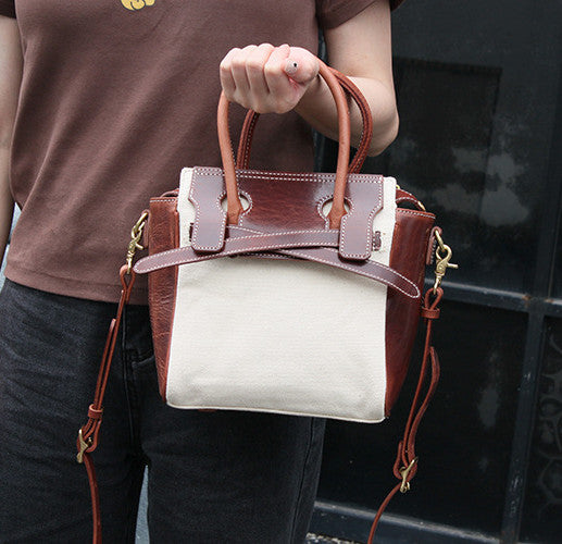 Versatile Women's Leather and Canvas Satchel with Multiple Carrying Options