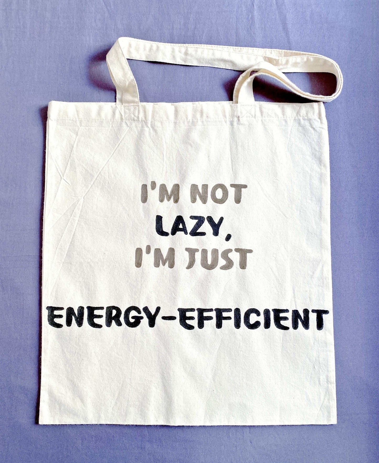 Large capacity eco-friendly shoulder bag for groceries and books.