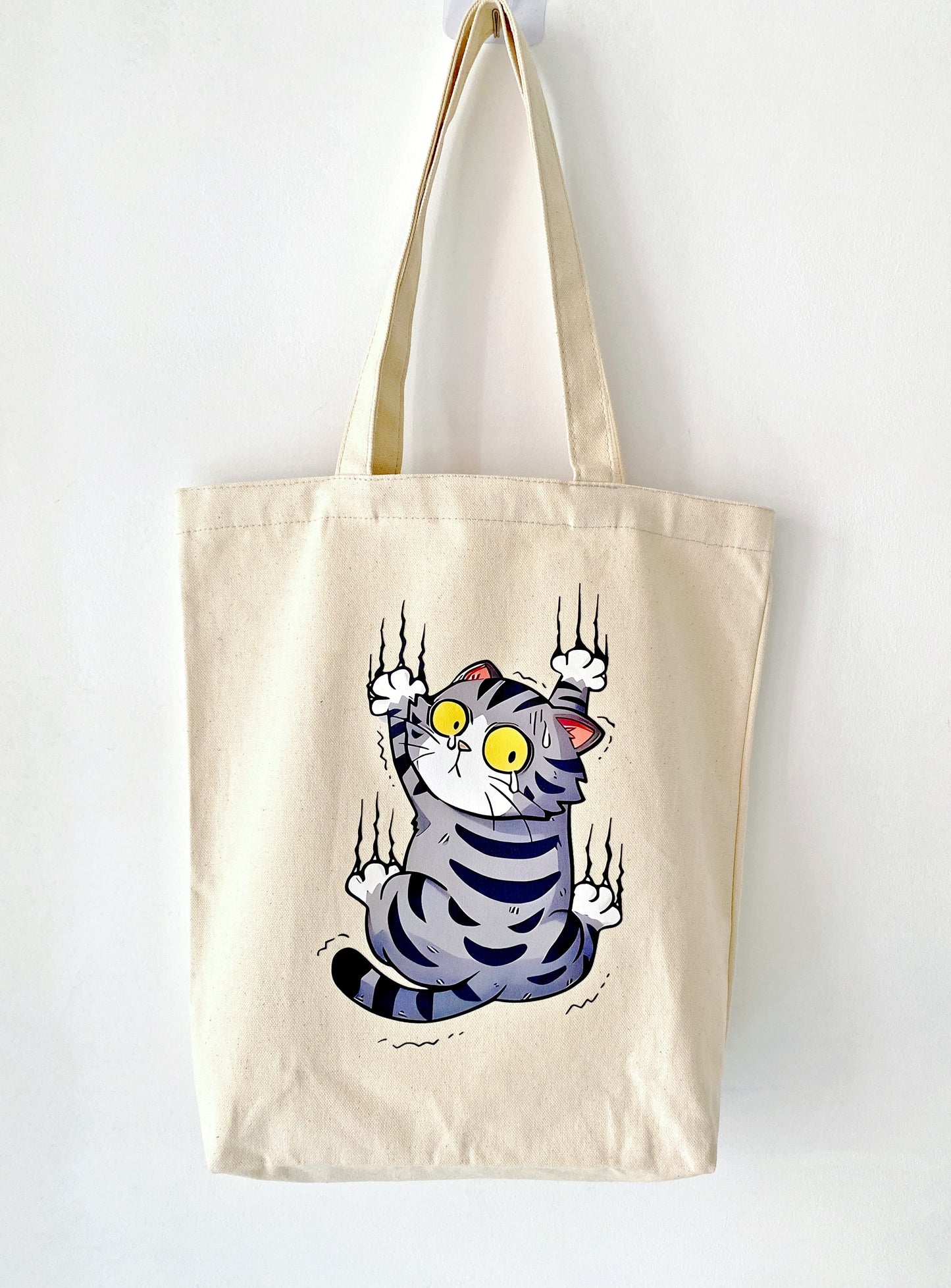reusable shopping tote with unique cat illustration detail