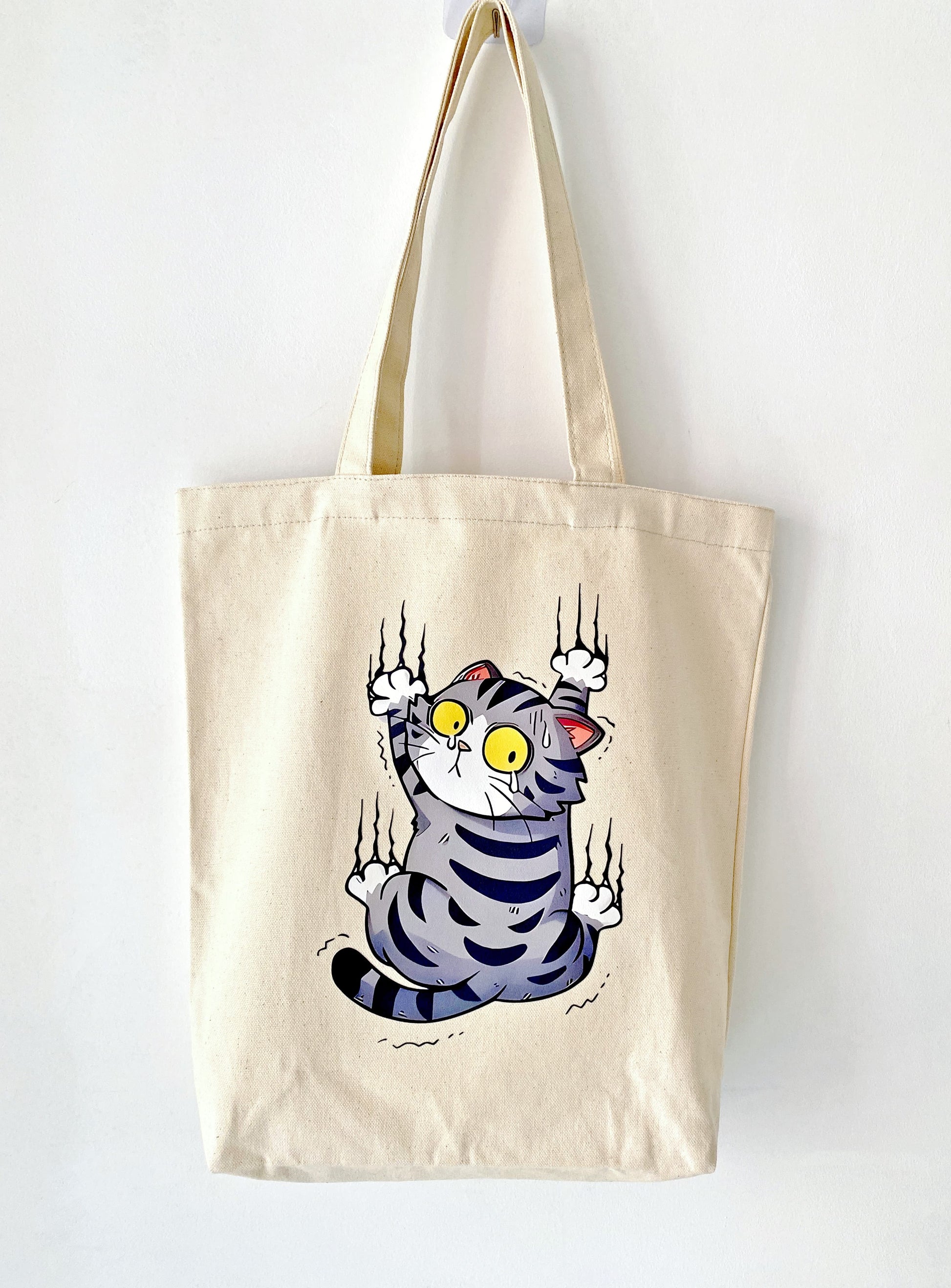 reusable shopping tote with unique cat illustration detail